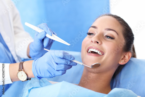 Adult woman having a visit at the dentist s