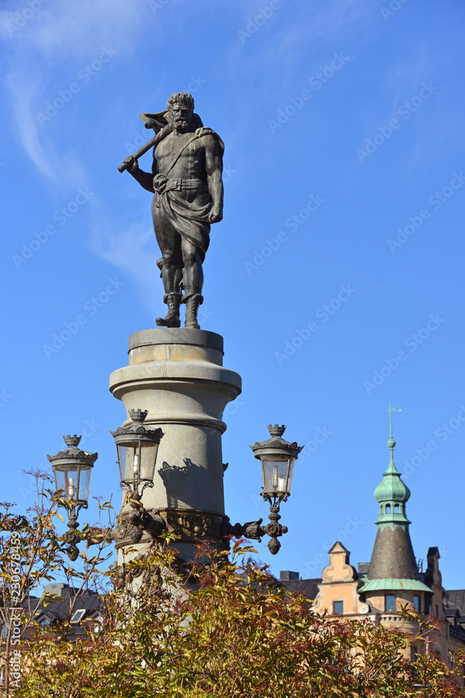 Thor with his hammer Mjolnir, sculpture militant Nordic god of Yurgordsbrun bridge (1897). Stockholm, Sweden