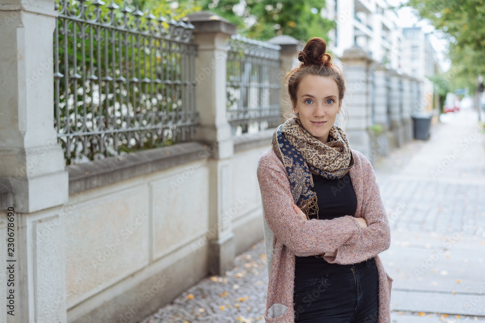 Confident stylish young businesswoman in town Confident stylish young businesswoman in town
