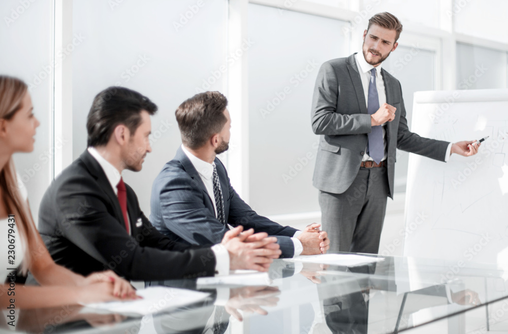 speaker makes a report for the business team. speaker makes a report for the business team.