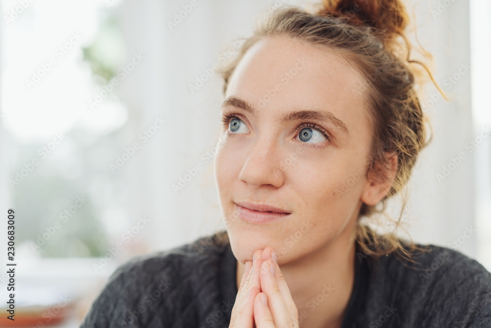 Young woman deep in thought Young woman deep in thought