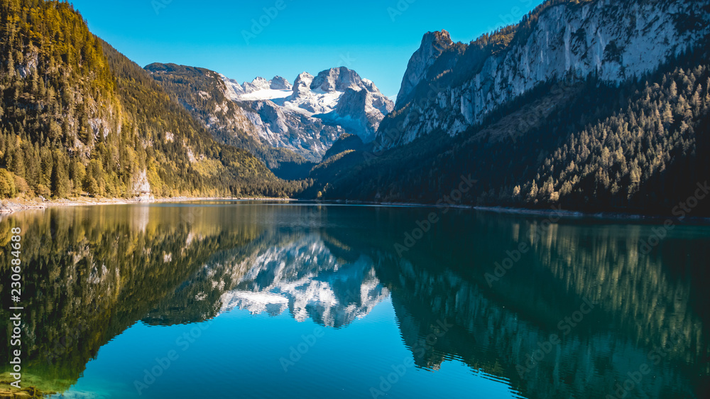 Beautiful alpine view with reflections at the famous Gosausee-Salzburg-Austria