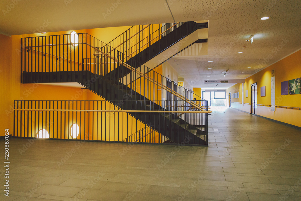 Fototapeta premium October 2018. Germany Helios Klinikum Krefeld. Interior hospital inside. Spacious deserted corridors of station, floor of new hospital, German European medicine. Theme of health care clinic interior
