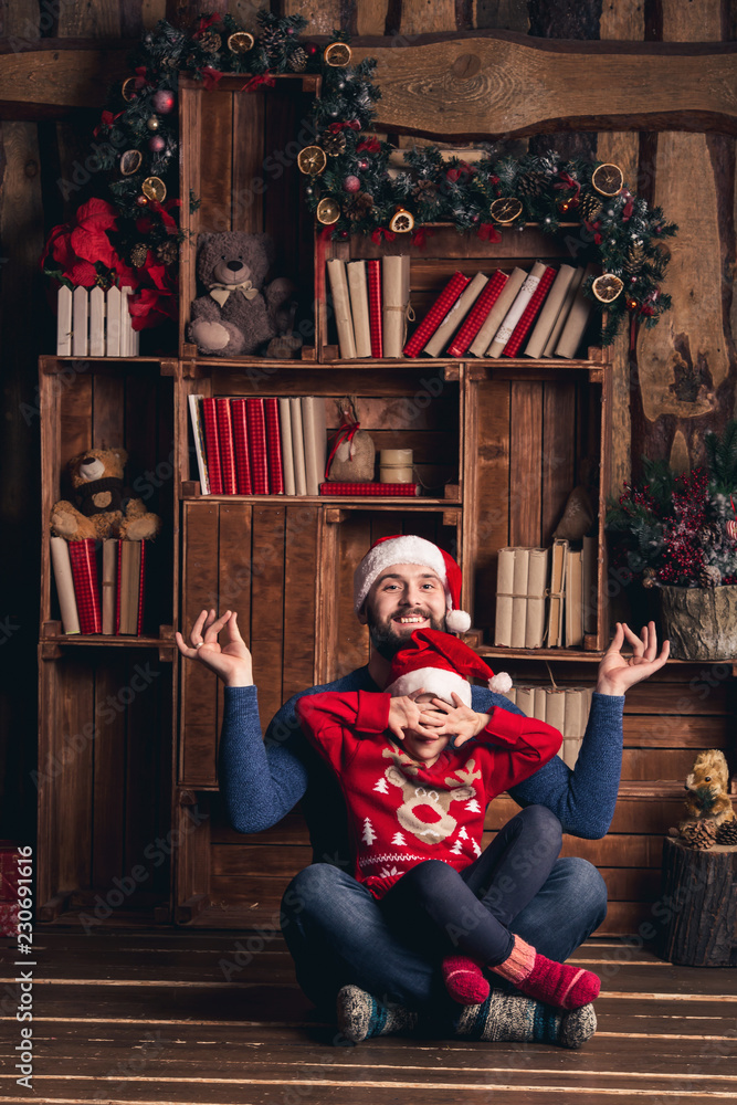 Father and daughter have fun at Christmas.