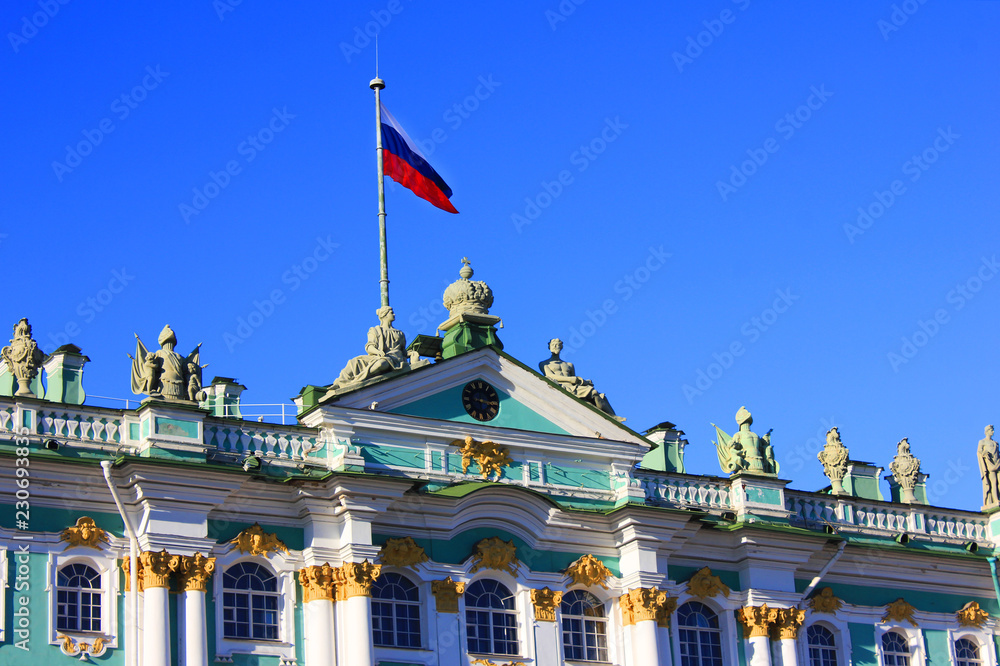 Winter Palace Building at Palace Square in Saint Petersburg, Russia. Facade Close Up of Winter Palace Exterior, Old Historical City Landmark Isolated on Empty Blue Sky Background on Summer Sunny Day