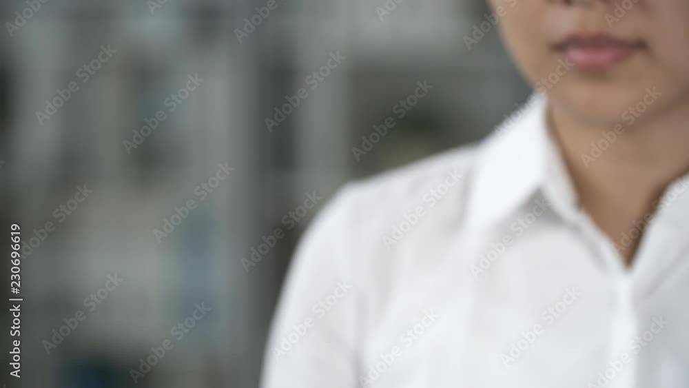Close up shot of businesswoman making pinching and tapping gestures on invisible augmented reality screen. Footage suitable for adding AR graphics Close up shot of businesswoman making pinching and tapping gestures on invisible augmented reality screen. Footage suitable for adding AR graphics