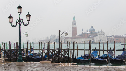 Gondolas in Venice under a street lamp © Massimo Cattaneo