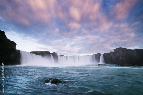 Icelandic waterfall Godafoss at sunset