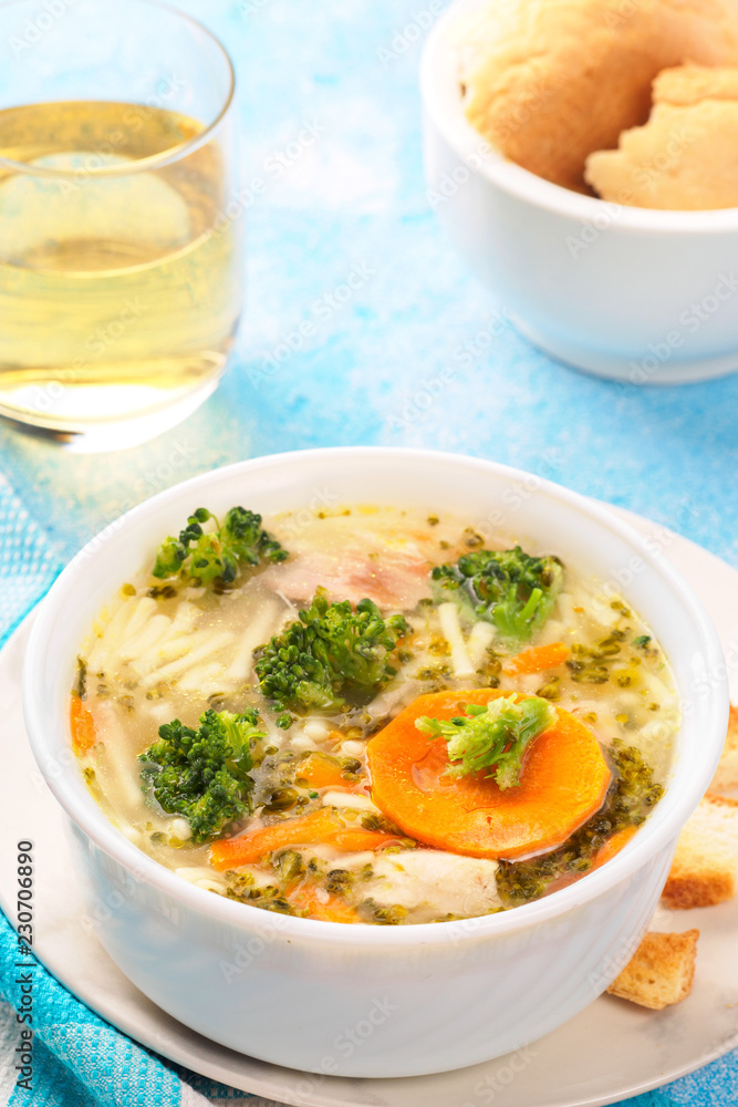 Italian vegetable soup with broccoli carrots and noodles in chicken broth Italian vegetable soup with broccoli carrots and noodles in chicken broth