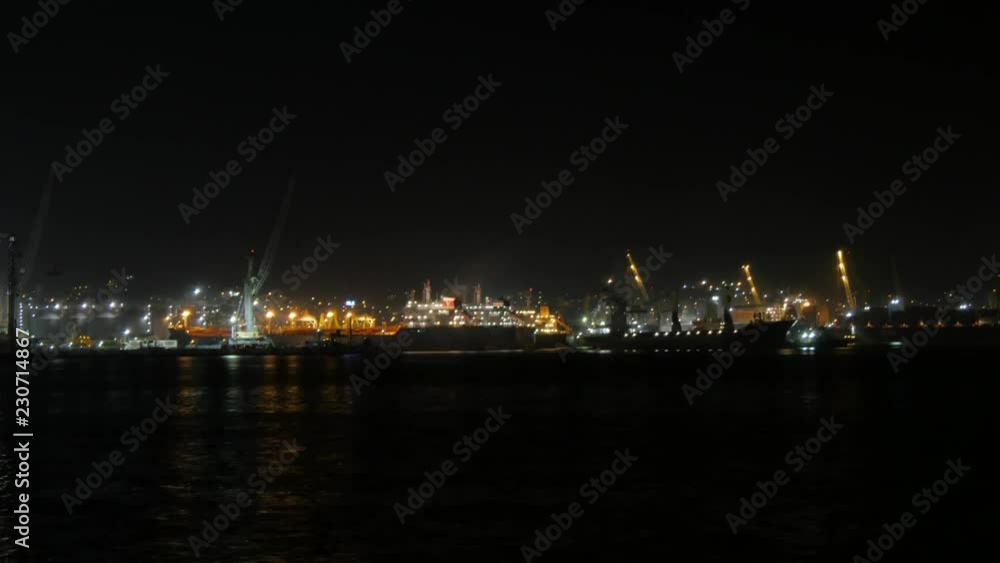 Ship mooring at the port of novorossiysk with tugs help, cemesskaya bay, russia, timelaps Ship mooring at the port of novorossiysk with tugs help, cemesskaya bay, russia, timelaps