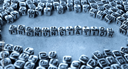 Pronunciation - Word from Metal Blocks on Paper - Concept Photo on Table
