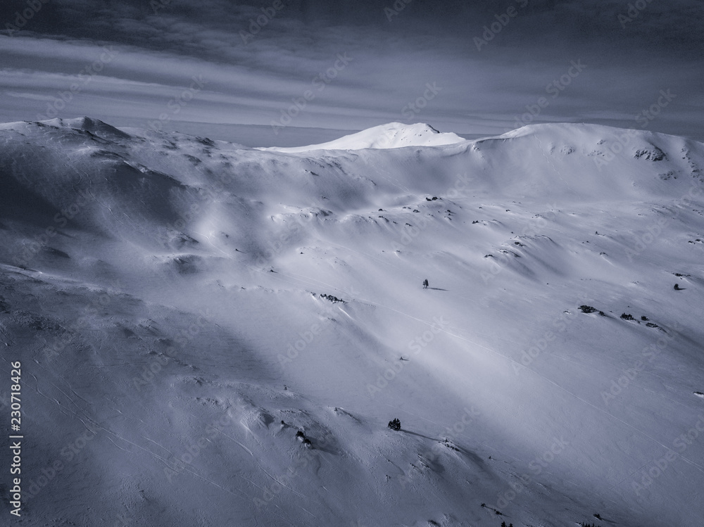 Aerial drone photograph of fresh snow after a winter blizzard in the Colorado Rocky Mountains.  Taken near Loveland Pass