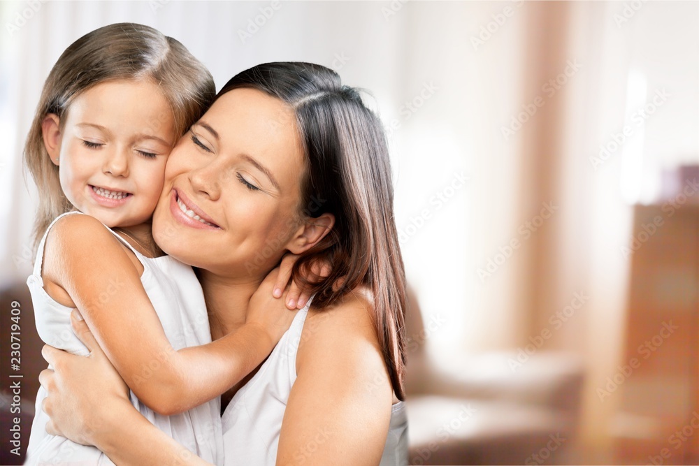 Happy Mother and daughter hugging Happy Mother and daughter hugging