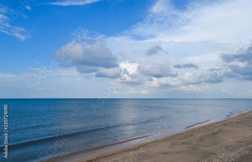 Deserted sea beach. Quiet sea Sea surface landscape.