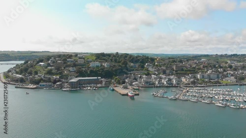 Located along Irelands 'Wild Atlantic Way',this fishing village and tourist destination can be seen from a beautiful aerial panoramic perspective photo