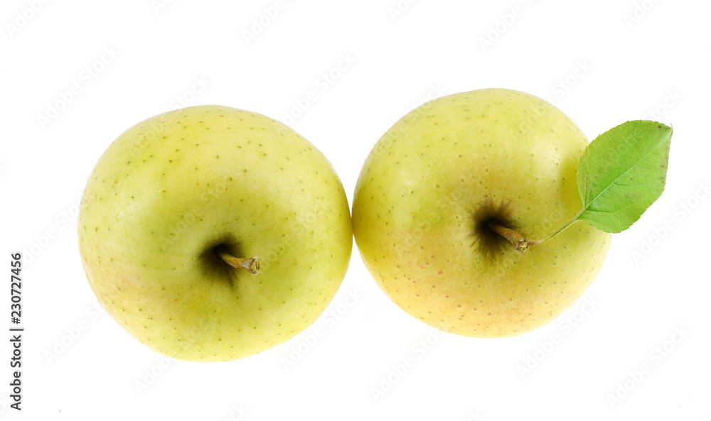 close up on golden delicious apples isolated on white background close up on golden delicious apples isolated on white background