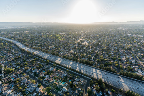 Sunset aerial view of Route 405 freeway crossing the San Fernando Valley in Los Angeles, California. photo