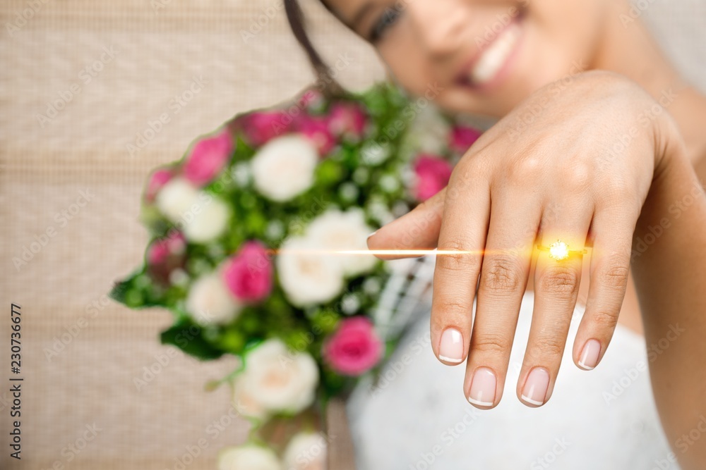 Fototapeta premium Close-up Beautiful Young Bride Showing hand and