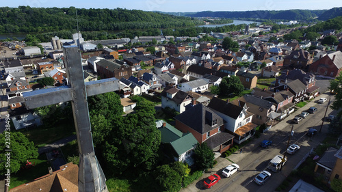 Cross above neighborhood photo