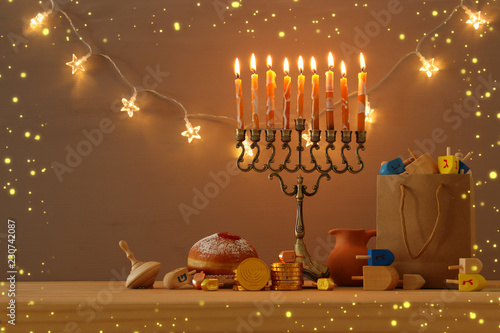 image of jewish holiday Hanukkah background with menorah (traditional candelabra).