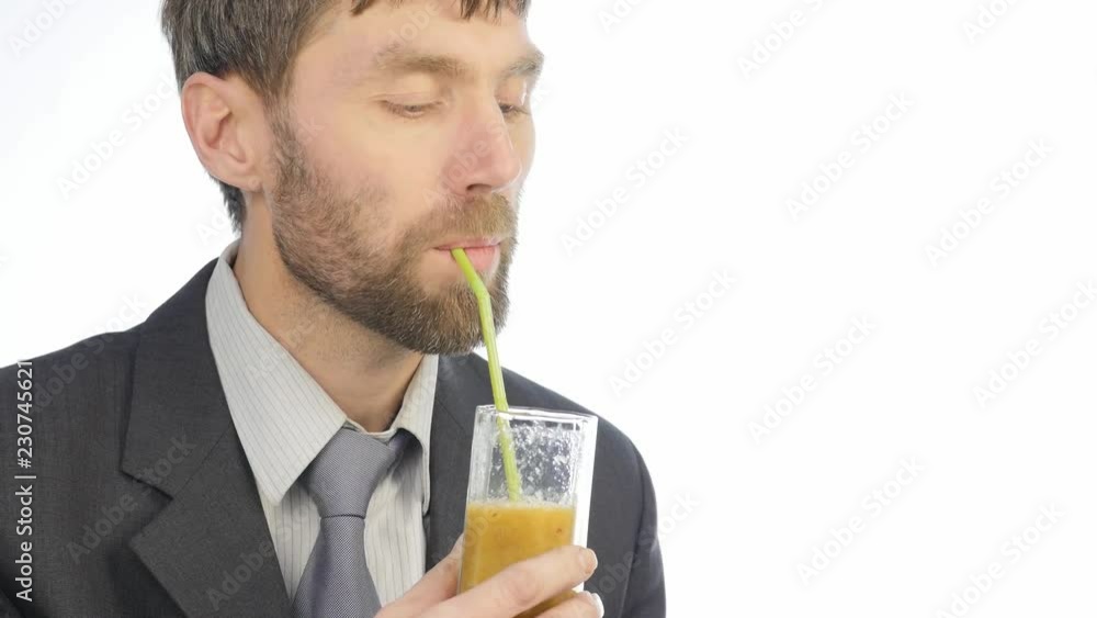 bearded businessman having healthy lunch, guy drinks vegetable smoothies. 4K