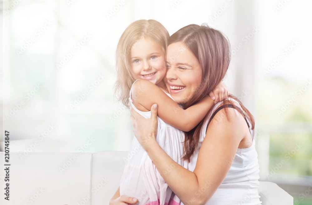 Happy Mother and daughter hugging Happy Mother and daughter hugging