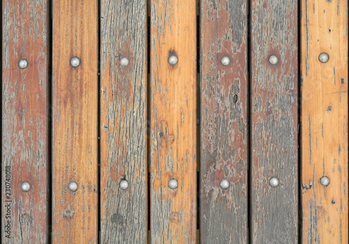 natural wooden plank fence texture with nuts