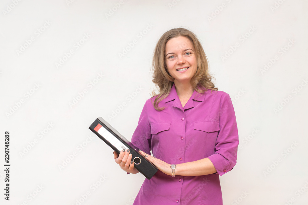 Happy girl is holding a folder with documents Happy girl is holding a folder with documents