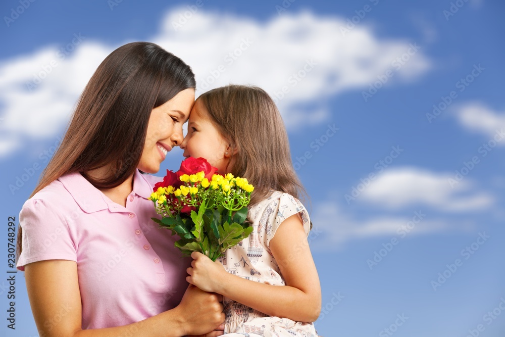 Young woman with little girl and beautiful Young woman with little girl and beautiful
