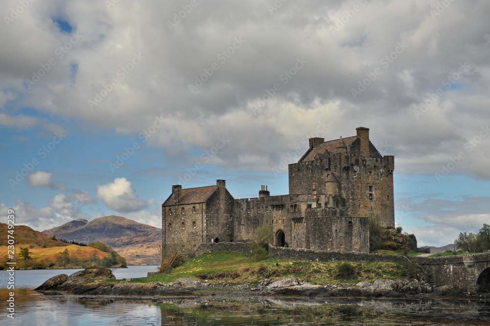 Scottish castle on a high rocky shore.
