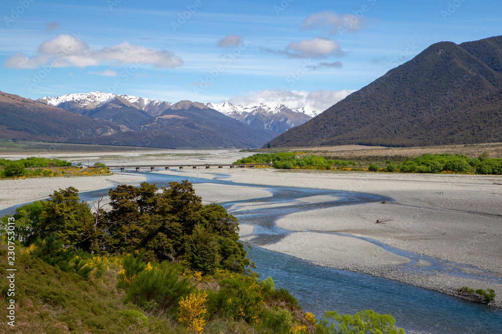 The beautiful Waimakariri River is a braided river and flows from the Southern Alps down the valley 