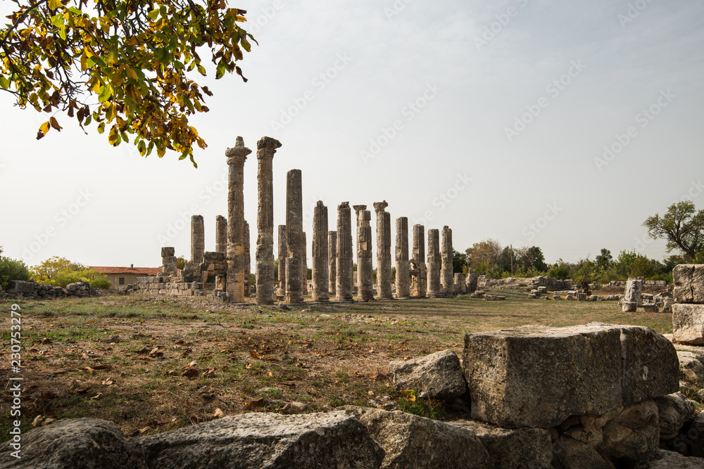Marble columns of Zeus temple at Uzuncaburc Ancient city. Uzuncaburc antique city is in the rural area of Silifke district. Mersin, Turkey