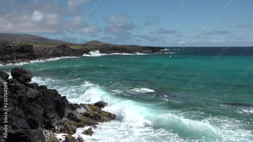 Waves of the Pacific Ocean break on the shore of Easter Island. Waves of the Pacific Ocean break on the shore of Easter Island.