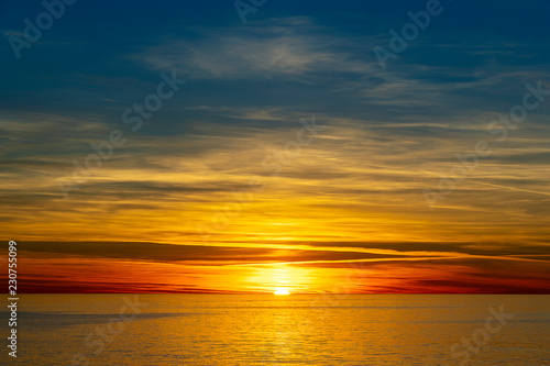 Colorful sunset above the sea. Summer vacation concept © OlegD