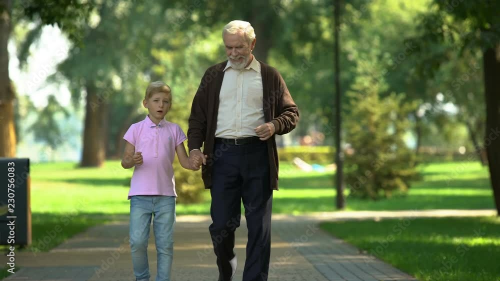 Boy tells grandfather about day at school, trusting relations and friendship Boy tells grandfather about day at school, trusting relations and friendship