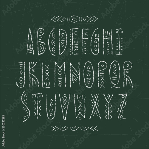 Vector runic alphabet written on blackboard with chalk.