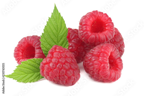 ripe raspberries with green leaf isolated on white background macro
