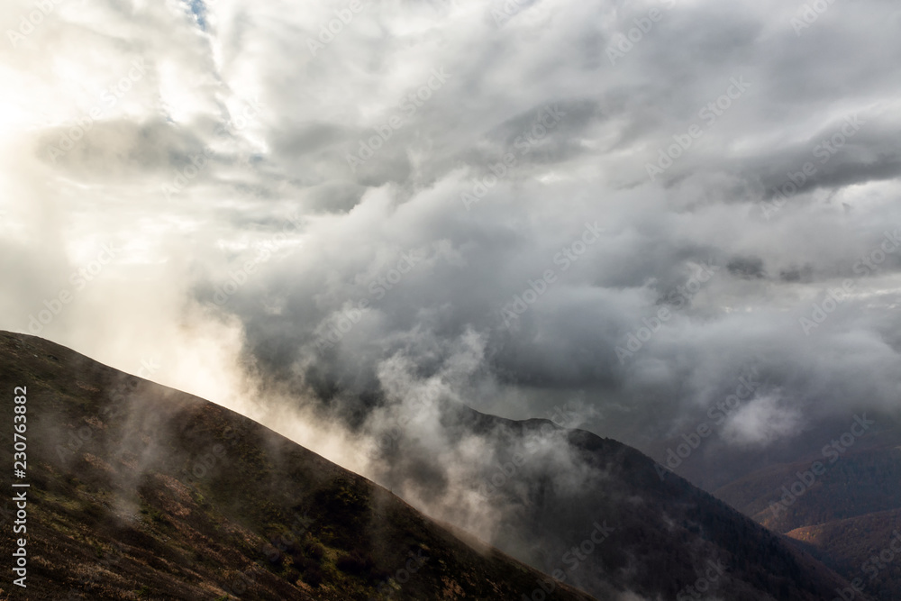 Rain clouds on the mountain hills.