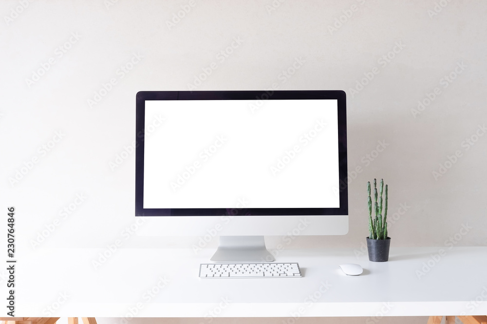 Fototapeta premium Workspace mockup computer, keyboard and mouse with cactus on office desk.
