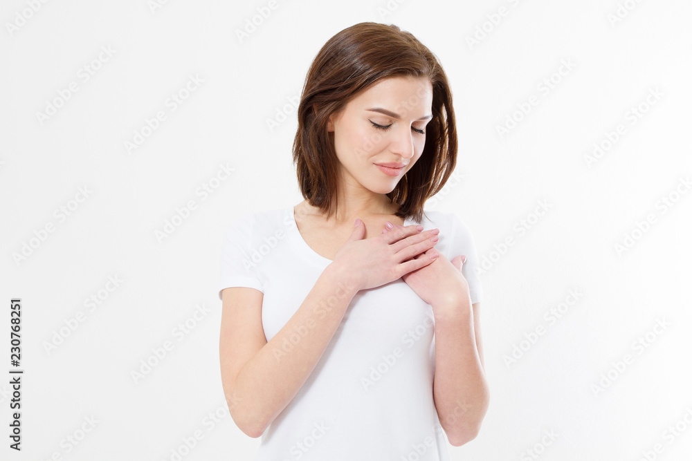 Young caucasian woman touching healthy heart isolated on white background. Feelings and love concept. Valentine day. Copy space Young caucasian woman touching healthy heart isolated on white background. Feelings and love concept. Valentine day. Copy space
