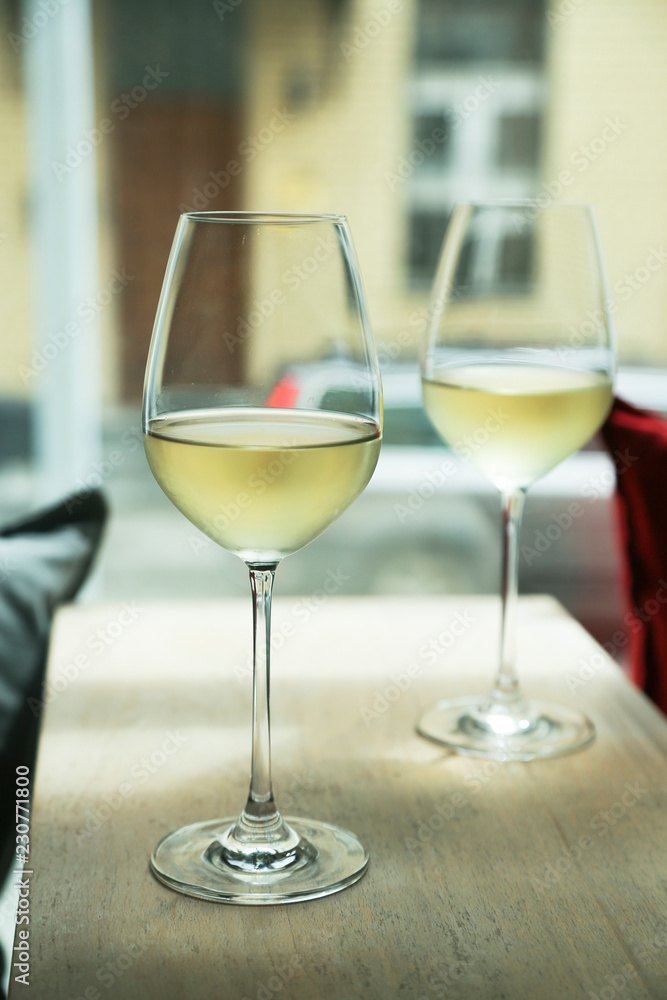 Refreshing white wine in a glass Refreshing white wine in a glass