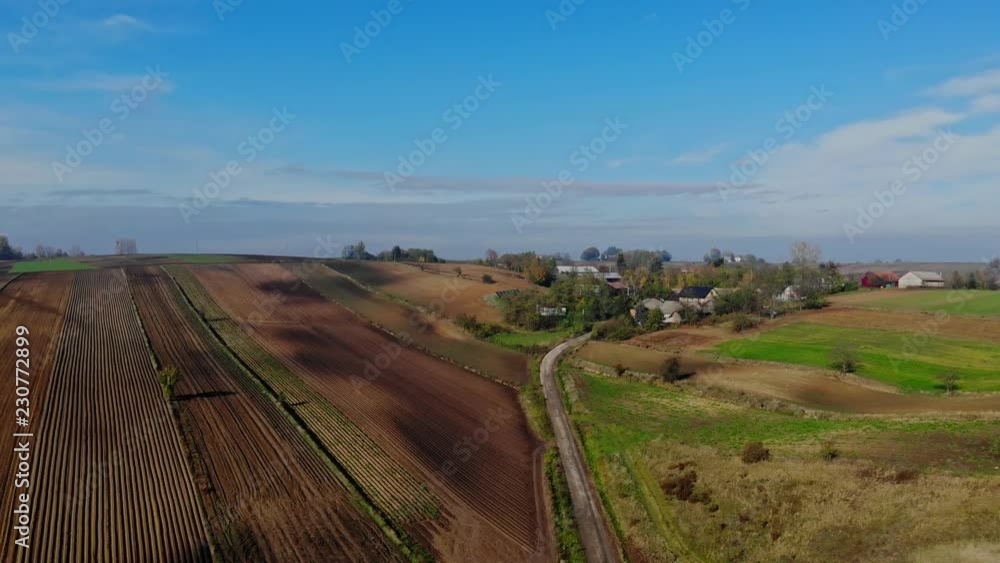 A flight over cultivated fields in the light of the autumn sun. A flight over cultivated fields in the light of the autumn sun.