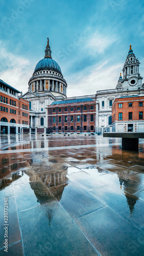 St Paul's Cathedral, London, UK. Reflected in water in Paternoster Square