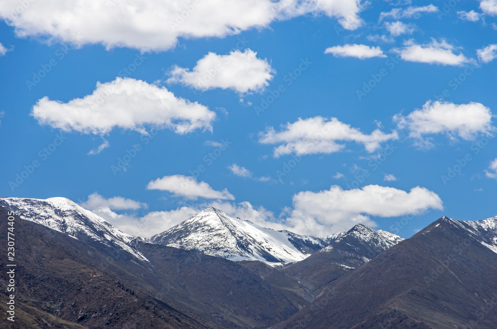 Desert and mountain over blue sky and white clouds on altiplano Desert and mountain over blue sky and white clouds on altiplano