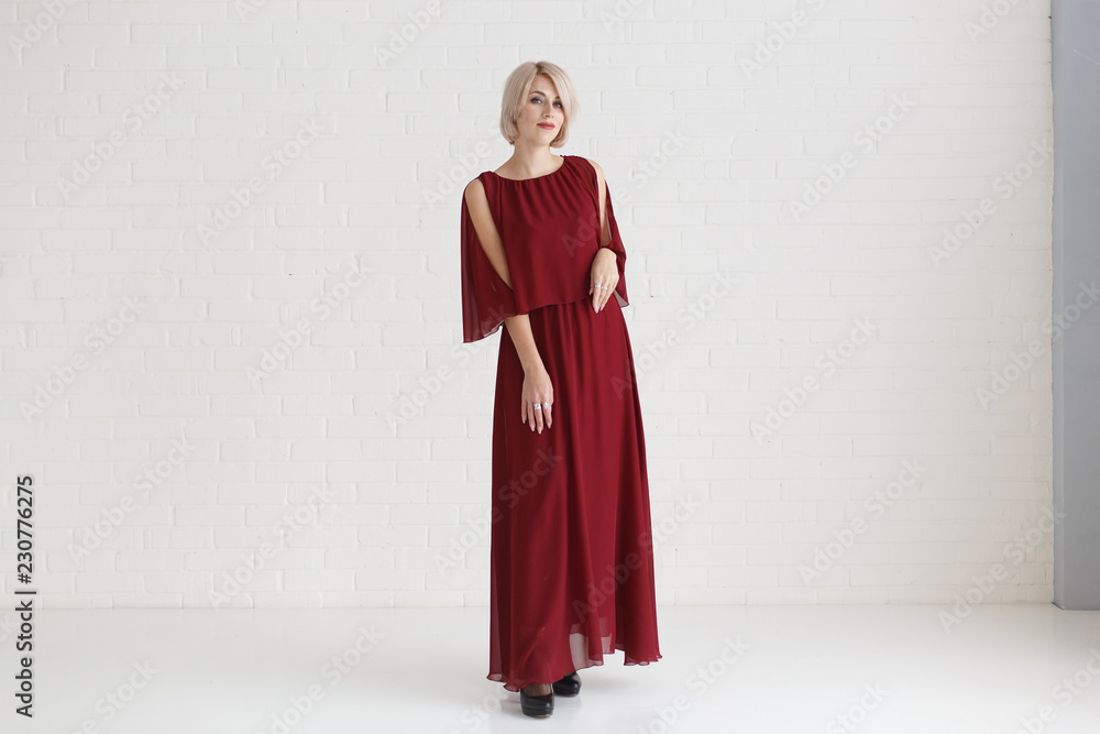 Fashion portrait of woman in red dress Fashion portrait of woman in red dress