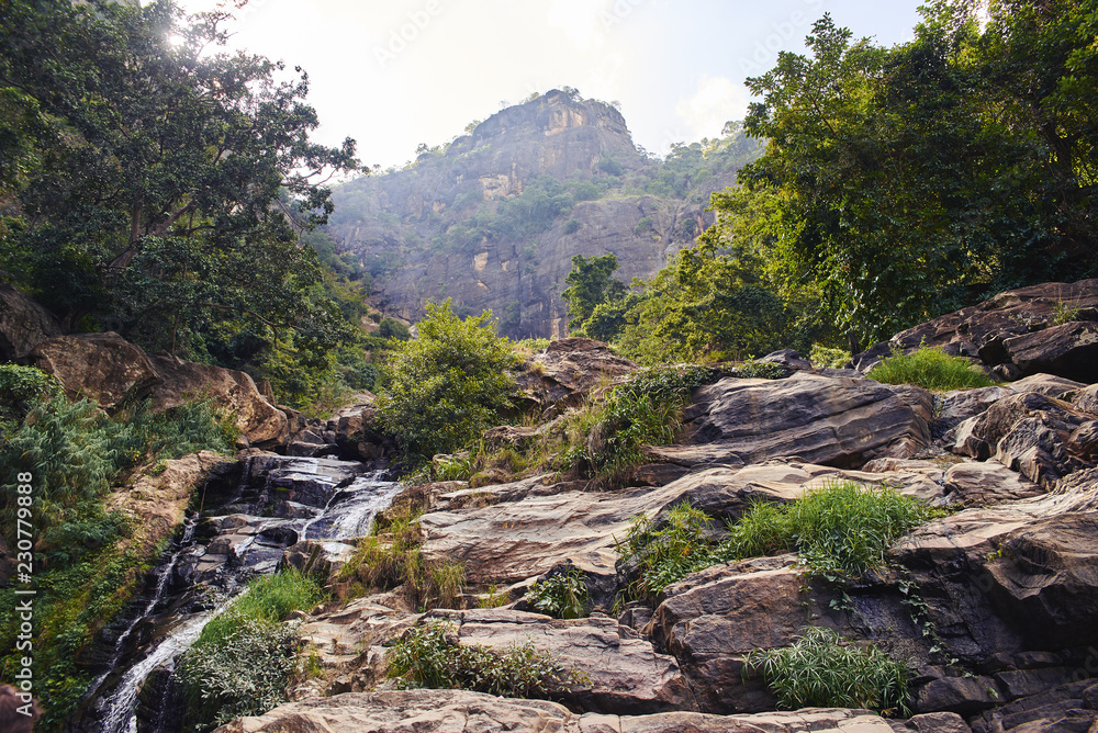 The Ravana Falls is a popular sightseeing attraction in Sri Lanka. The Ravana Falls is a popular sightseeing attraction in Sri Lanka.