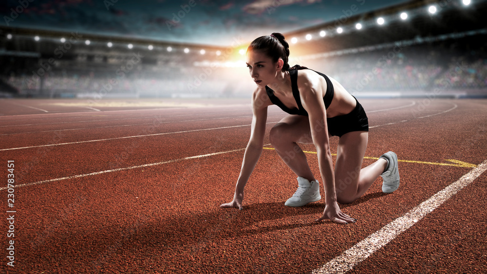 Foto Stock Female athlete ready to run. Mixed media | Adobe Stock