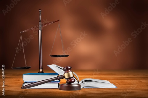 Justice Scales and books and wooden gavel