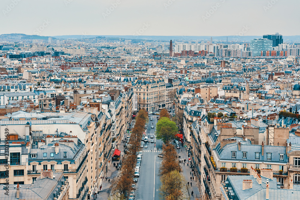 Obraz premium PARIS, FRANCE -APRIL 9, 2018: View from the Arc de Triomphe to the city
