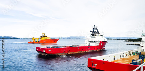 Offshore ships in Norwegian fiords arriving for resupply and refuel